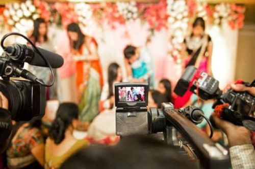Creative professional filming a project
